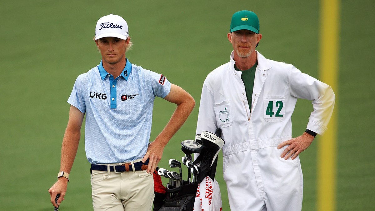 Will Zalatoris stands with caddie Ryan Goble