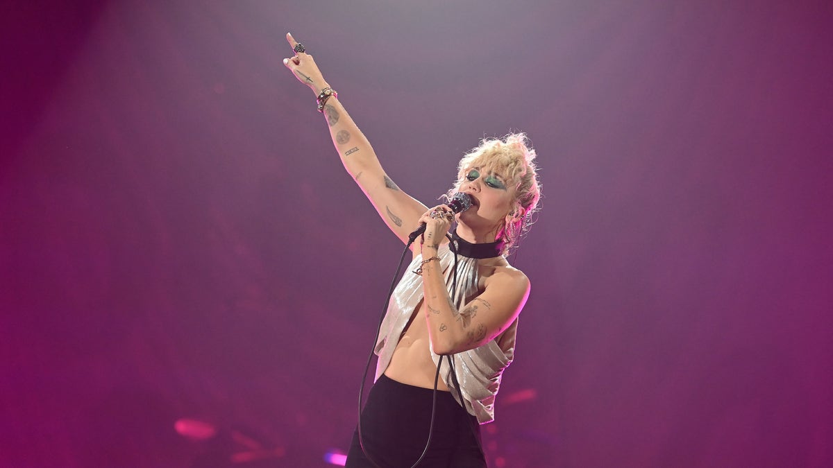 Miley Cyrus performs on stage