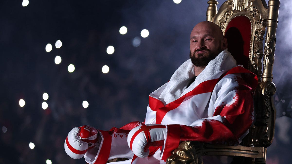 Tyson Fury sits on a throne