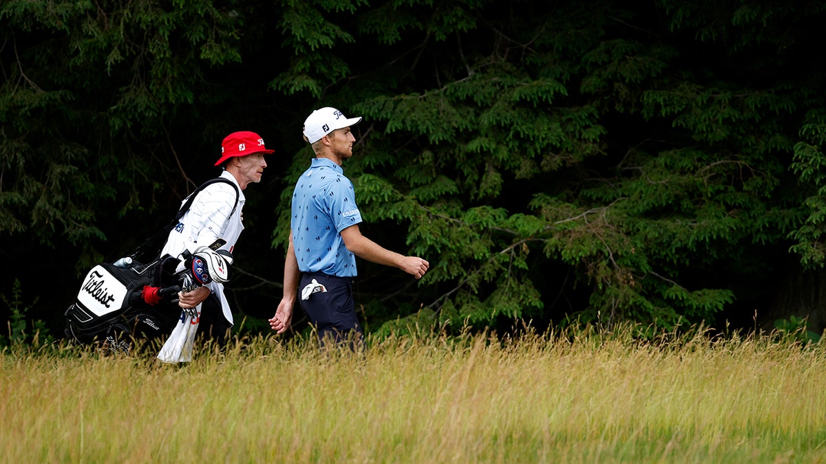 Will Zalatoris walks with Ryan Goble