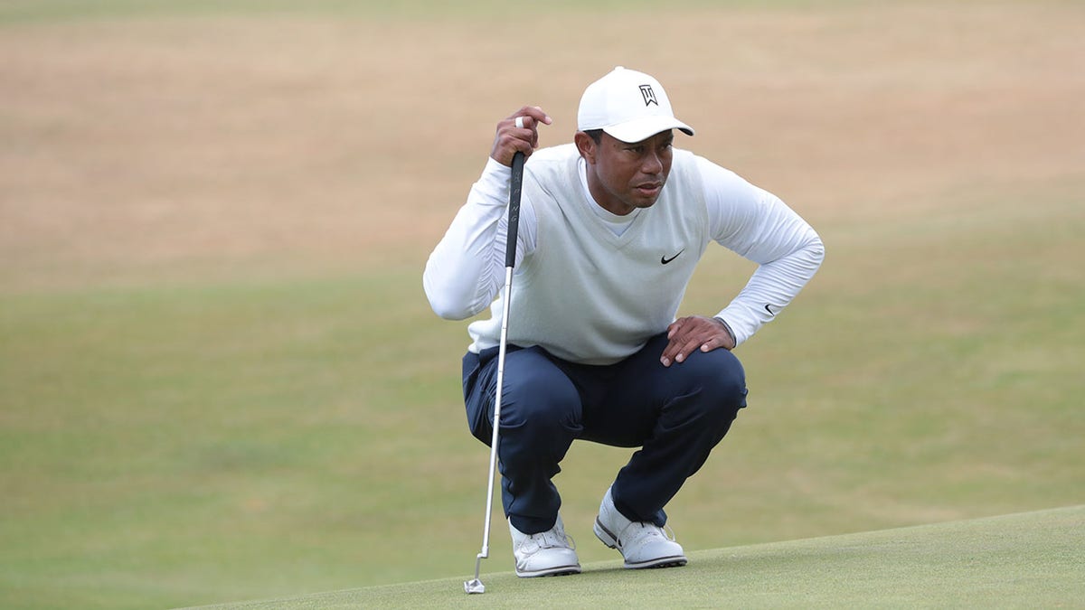 Tiger Woods looks at a putt at the Open Championship