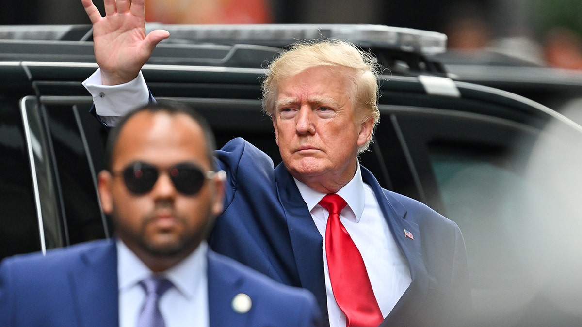 Donald Trump waving in New York