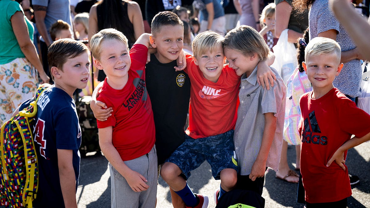 friends reunite on first day of school