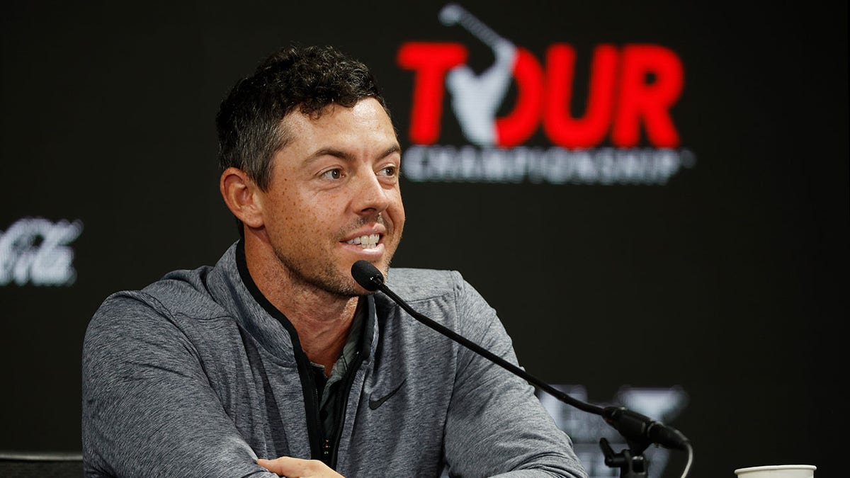 Rory McIlroy address the media