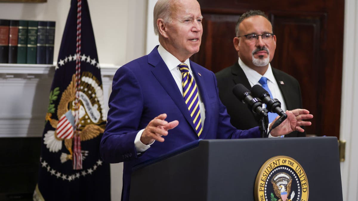 President Biden and Miguel Cardona