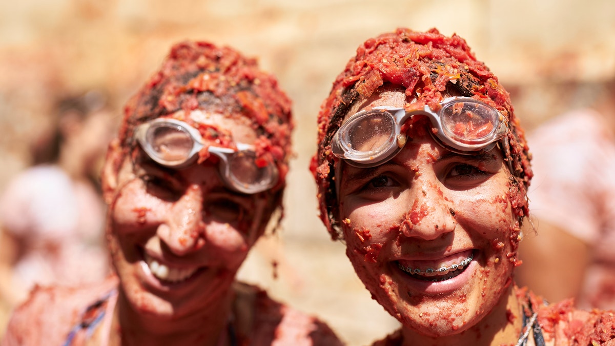 Women with goggles at La Tomatina