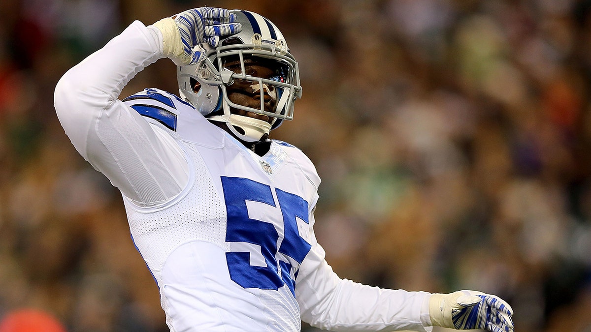 Rolando McClain reacts to play