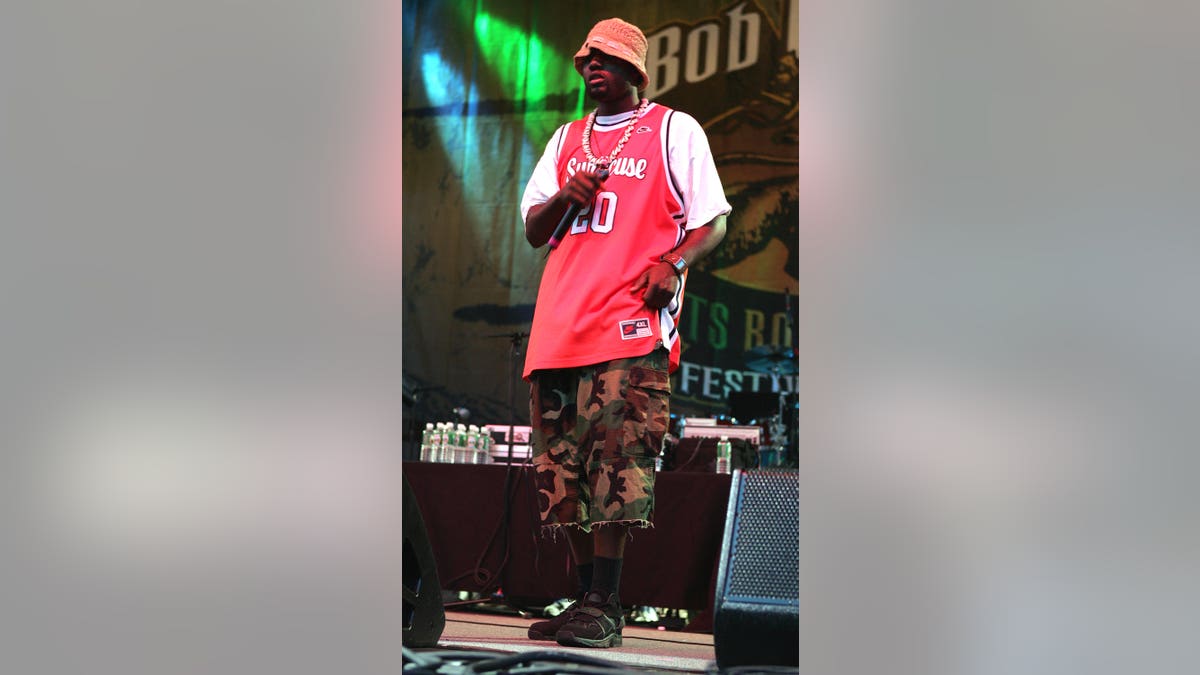 Photo shows Nappy Roots rapper Fish Scales performing on stage 