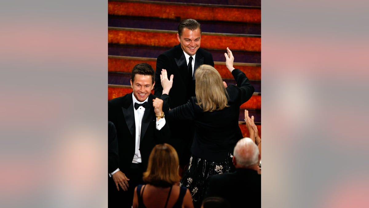 Leonardo DiCaprio and Mark Wahlberg celebrate