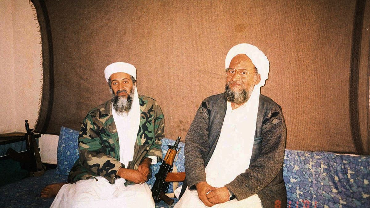 Usama bin Laden and al Qaeda leader Ayman Al Zawahri sitting together