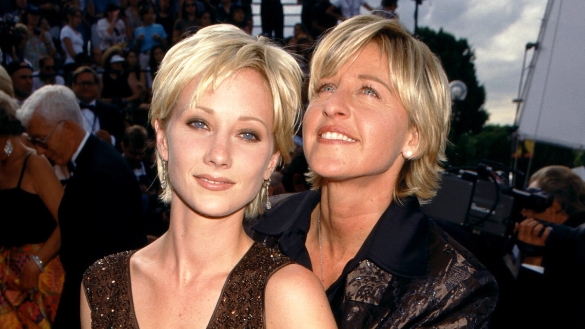 Anne Heche and Ellen DeGeneres on red carpet at the Emmys