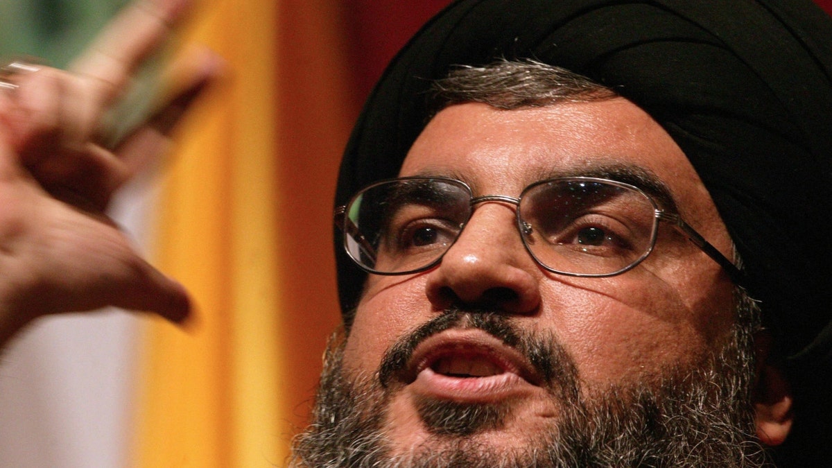 Lebanese Hezbollah leader Hassan Nasrallah speaks to supporters