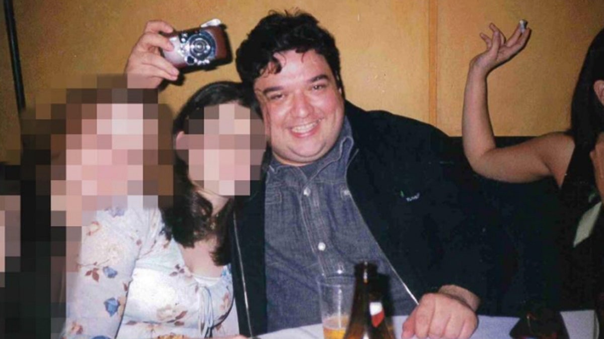 Jane Doe poses with Horatio Sanz at an Italian restaurant