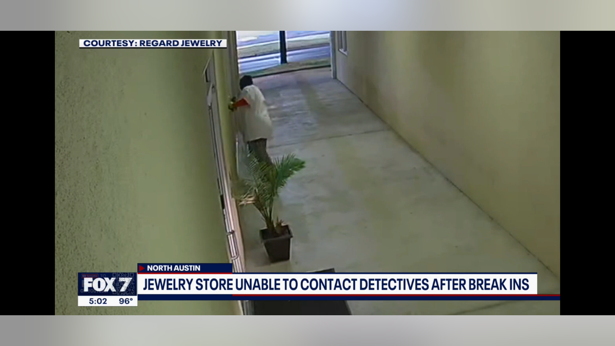 Surveillance footage provided by Regard Jewelry shows a thief attempting to break in