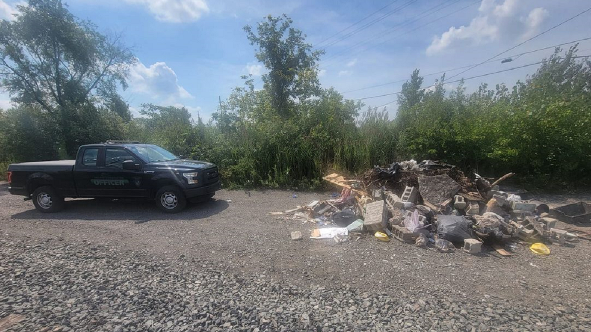 Indiana illegal dumping trash pile