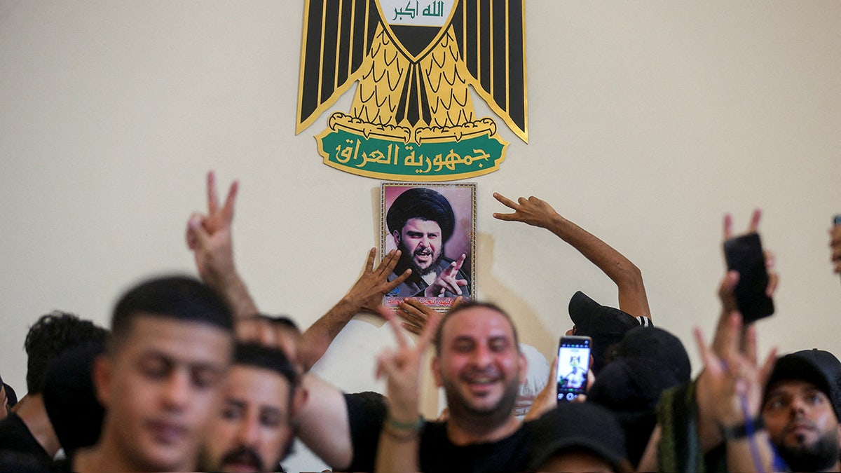 Iraqi supporters of Moqtada al-Sadr protest