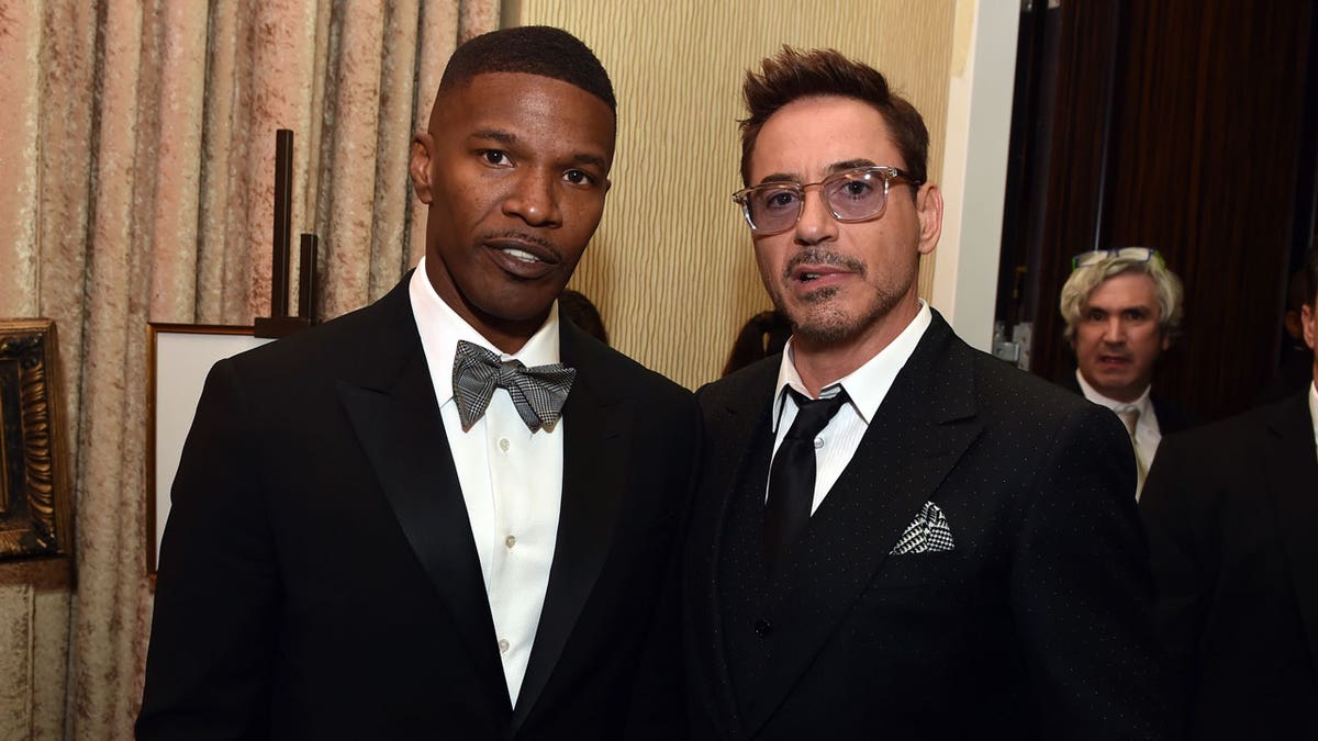 Jamie Foxx and Robert Downey Jr. pose for a photo