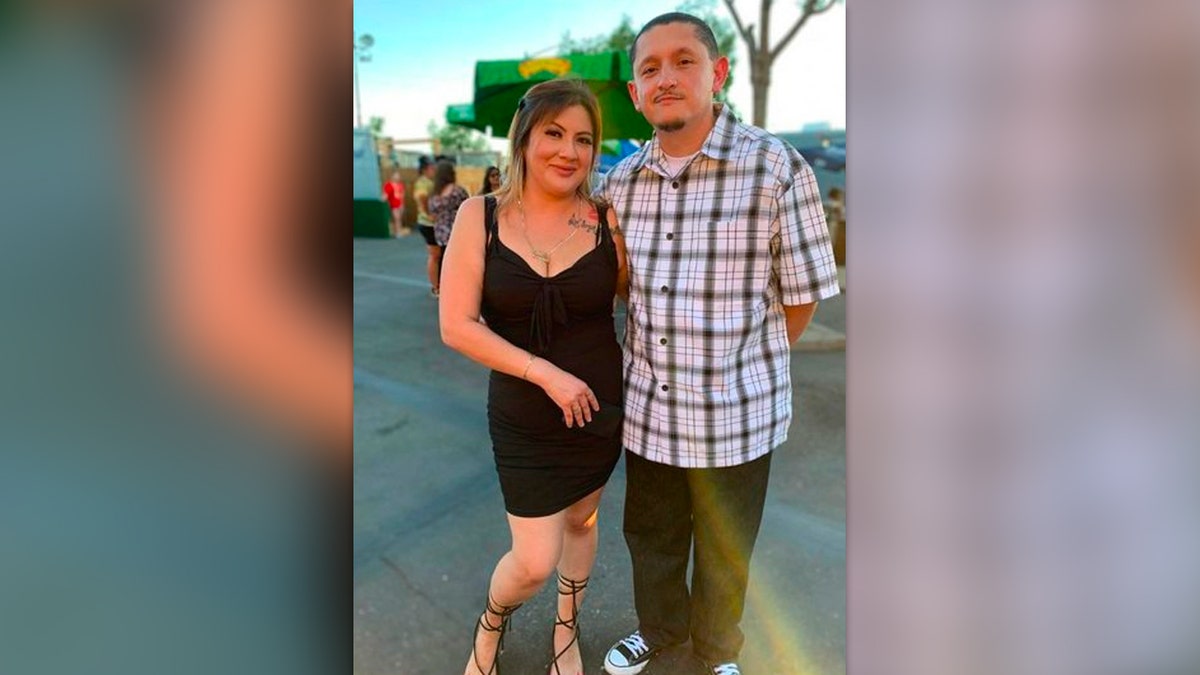 Janette Pantoja in a black dress and Juan Almanza Zavala in pants and a checkered shirt