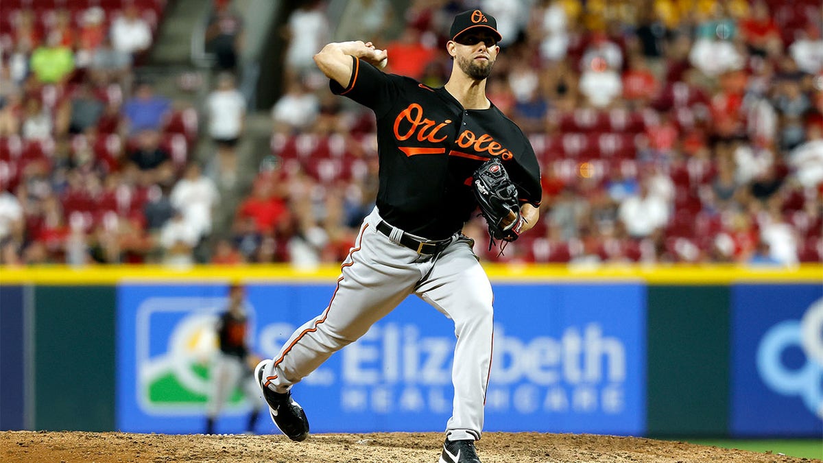 Jorge López throws pitch