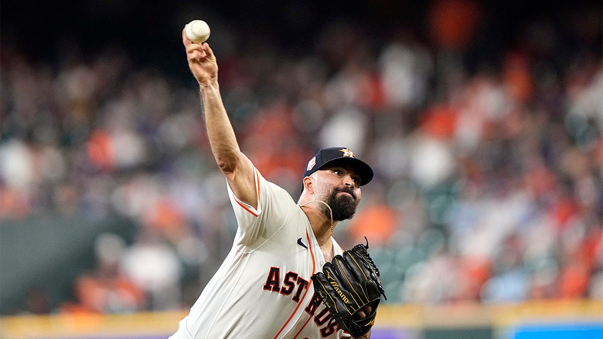 Jose Urquidy throws pitch