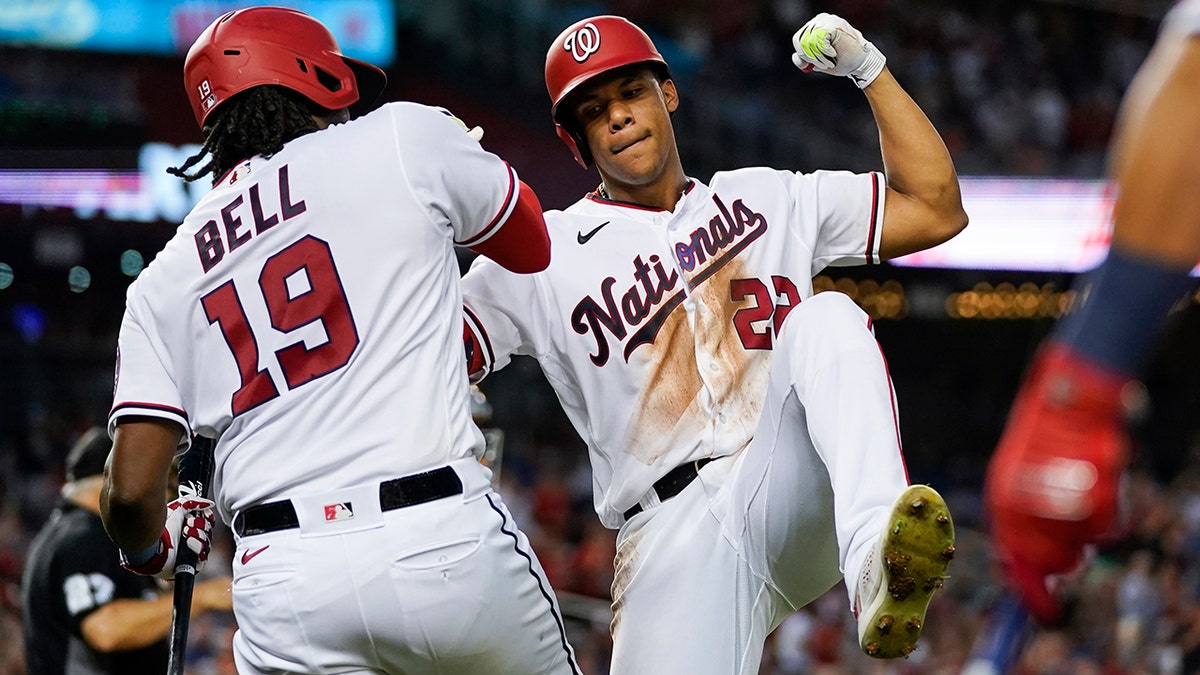 Juan Soto celebrates after a homer