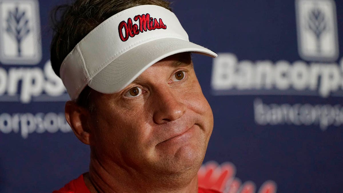Lane Kiffin talks to reporters on August 2022