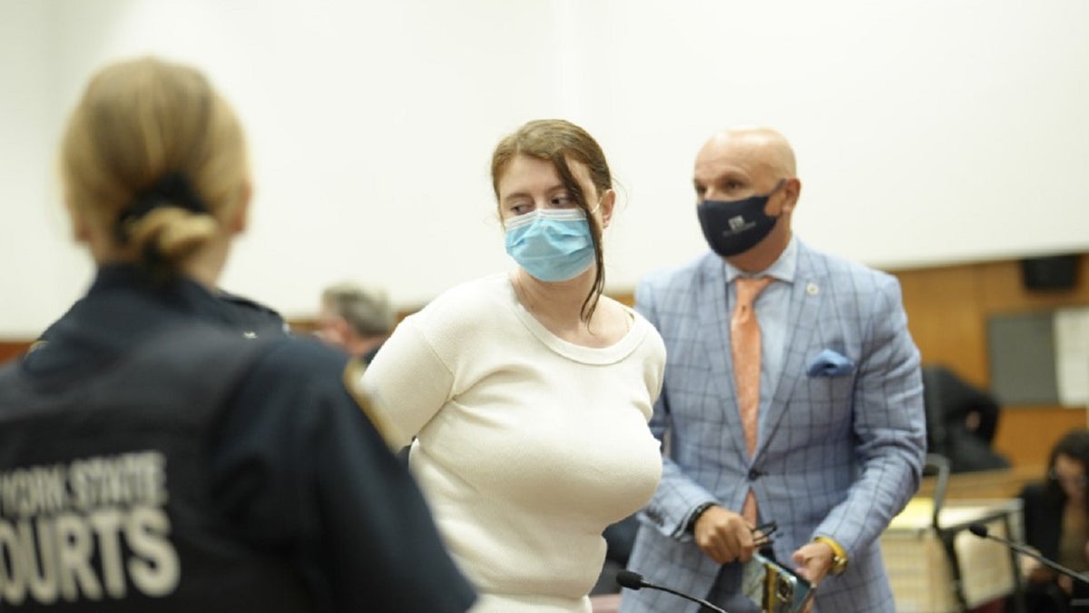 handcuffed Lauren Pazienza in court