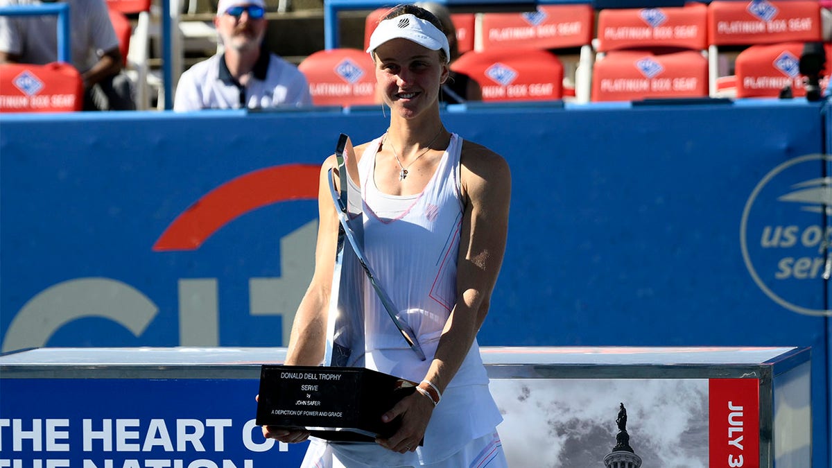 Liudmilla Samsonova holds trophy