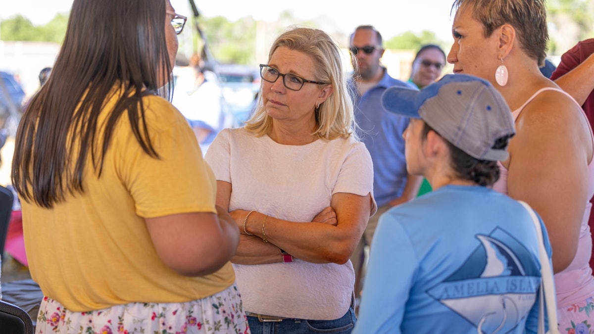 Rep. Liz Cheney talks with voters at Wyoming's Wind River Reservation, on July 16, 2022