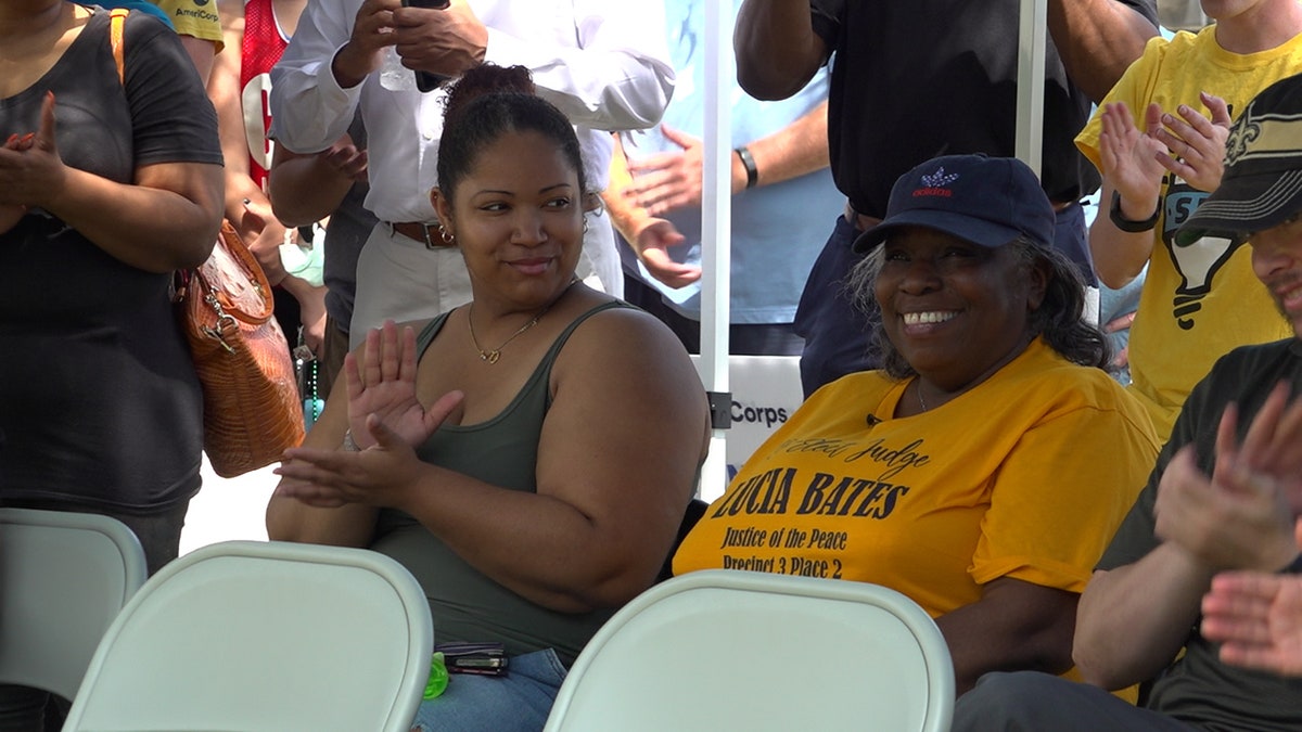 Claudette and her daughter smiling