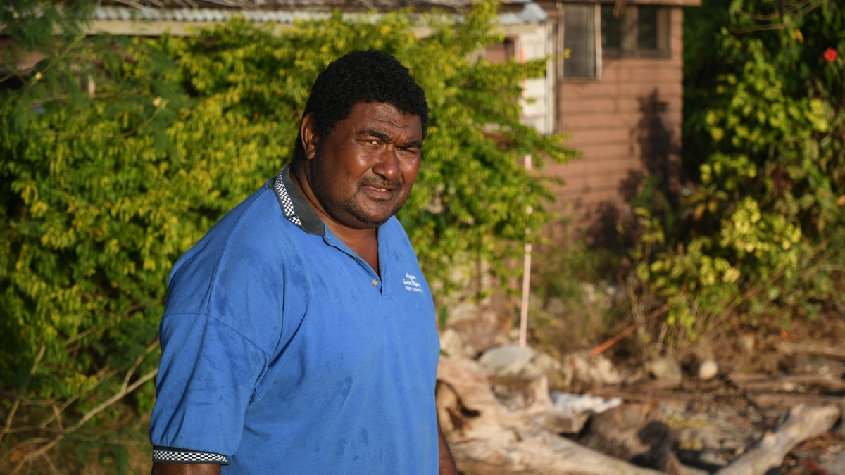 Manoa Ratulele speaks on the beach where he found Bradley Dawson