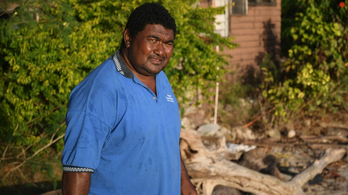 Manoa Ratulele speaks on the beach where he found Bradley Dawson