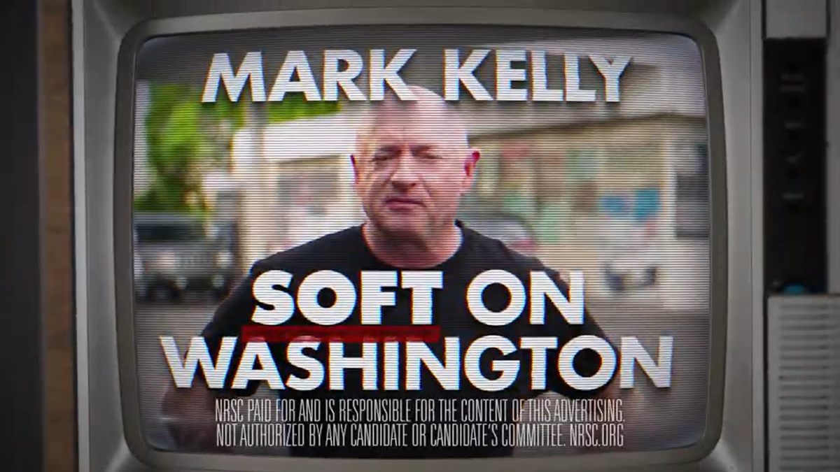 A screenshot of an NRSC ad calling Sen. Mark Kelly "soft on Washington"
