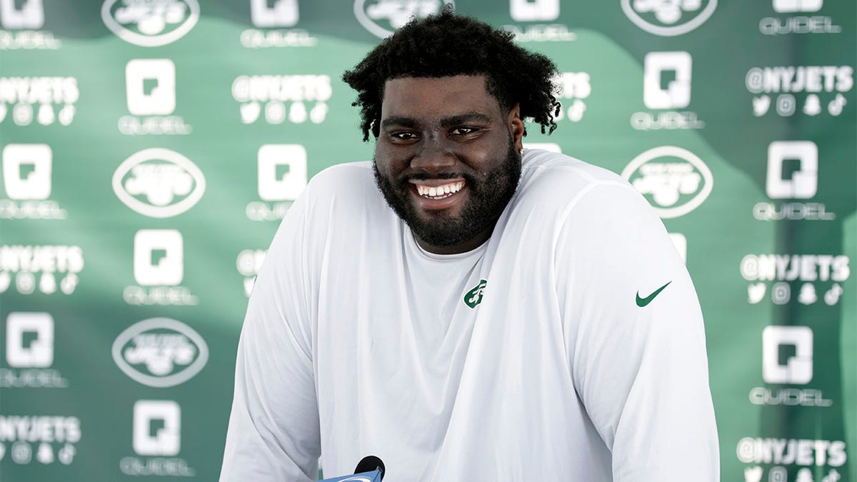 Mekhi Becton speaks to the media