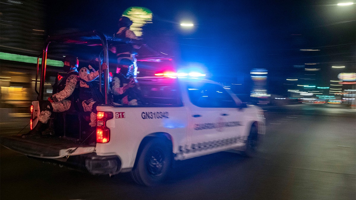 Mexican National Guard members patrol in Tijuana