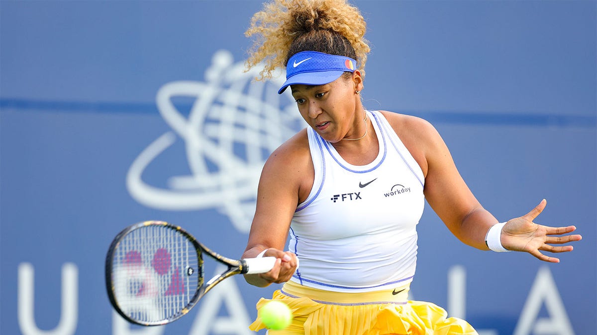 Naomi Osaka plays forehand shot