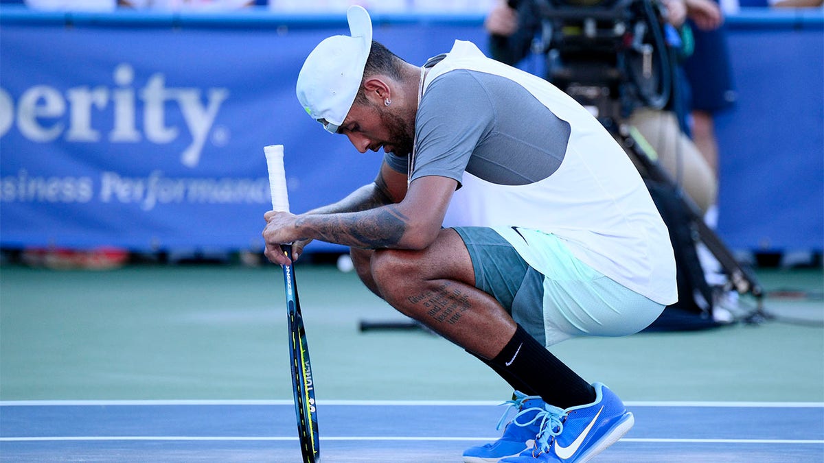 Nick Kyrgios pauses after victory