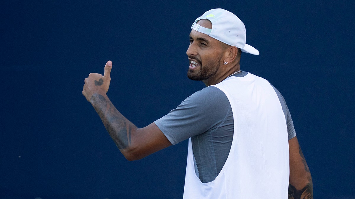 Nick Kyrgios gives a thumbs up