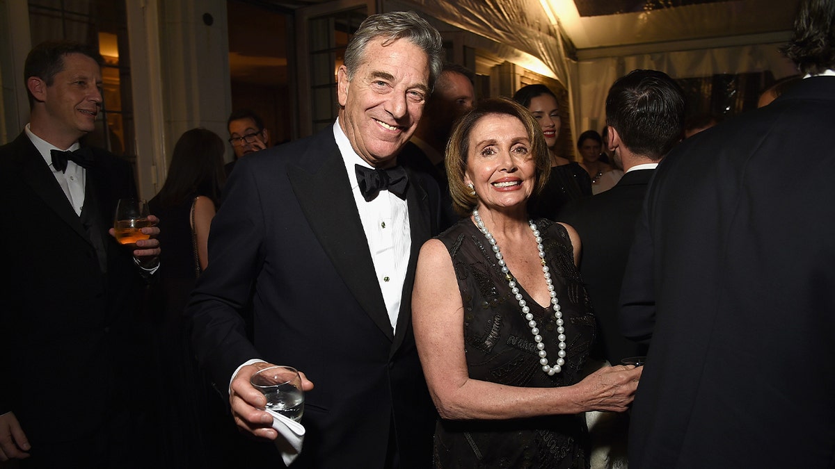 Paul Pelosi (L) and Nancy Pelosi