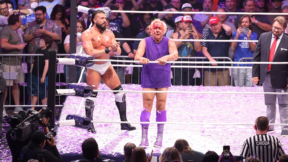 Andrade with Ric Flair