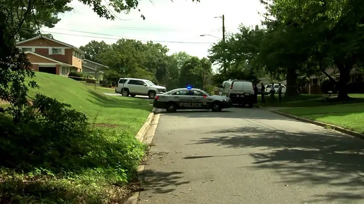 Several police vehicles in a Temple Hills neighborhood