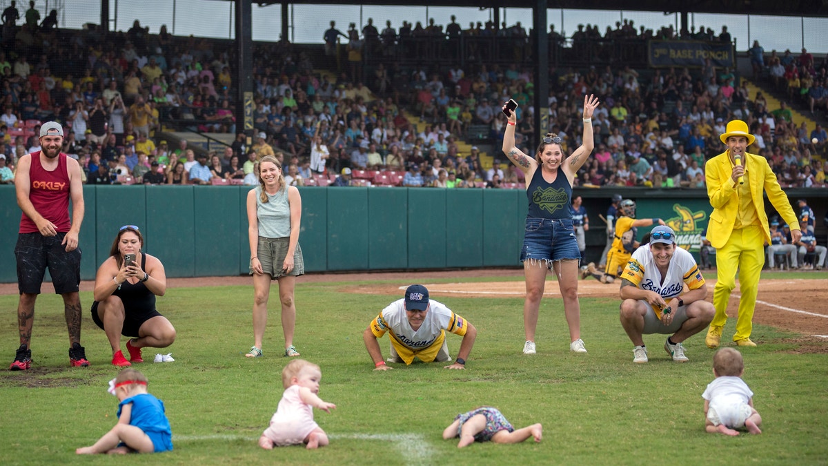 Fans participating in on-field games