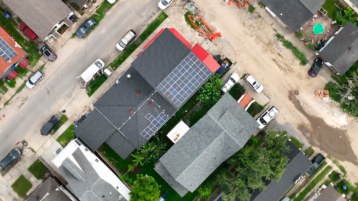 Bird's eye view of solar panels on the roof of the restaurant