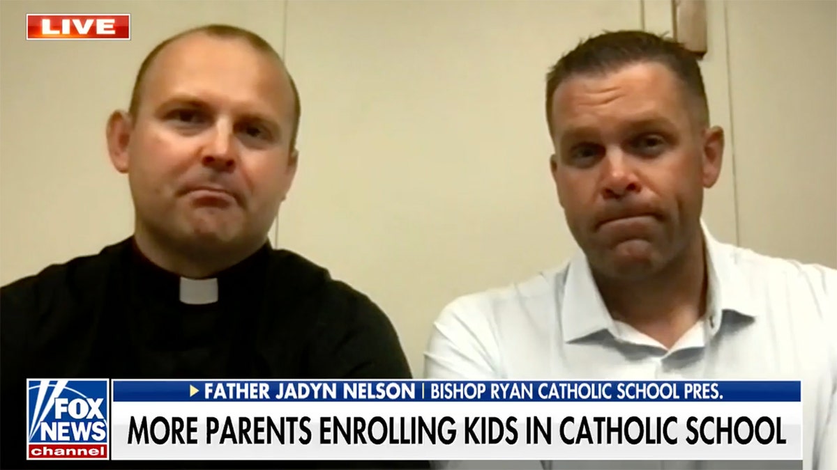 priest and dad talk about Catholic school