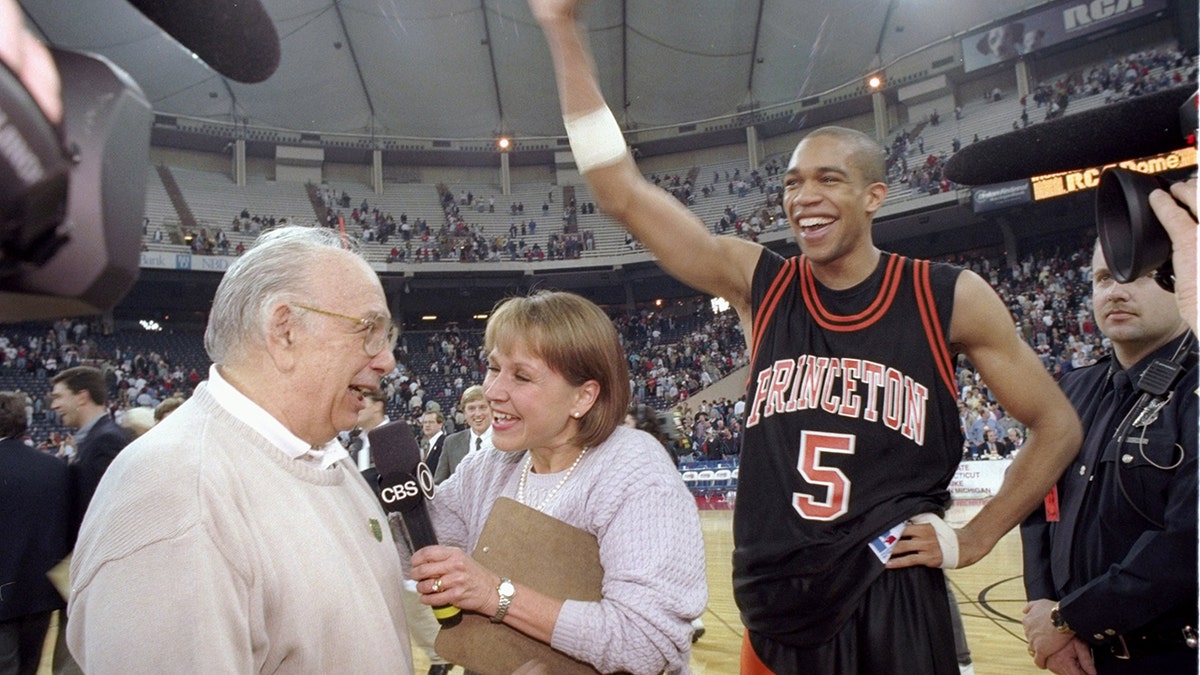 Pete Carril and Sydney Johnson celebrate