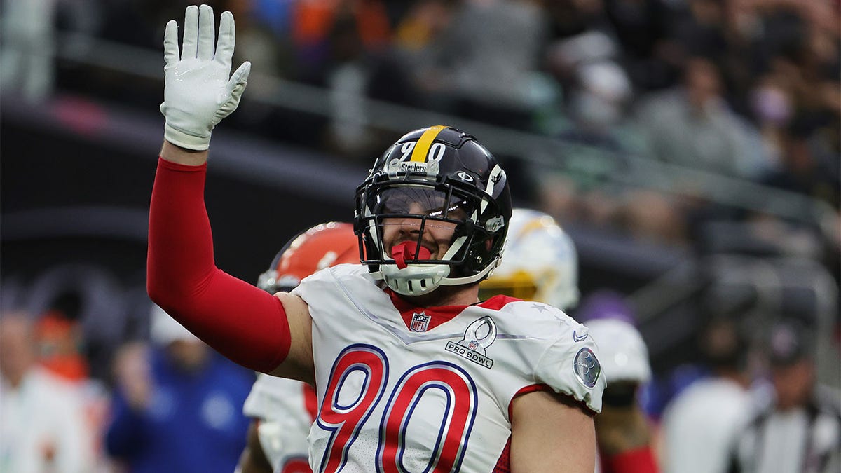 T.J. Watt waves to fans