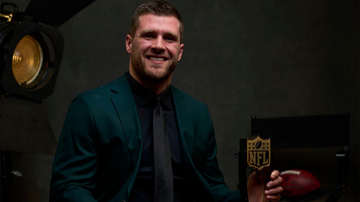 T.J. Watt poses with trophy