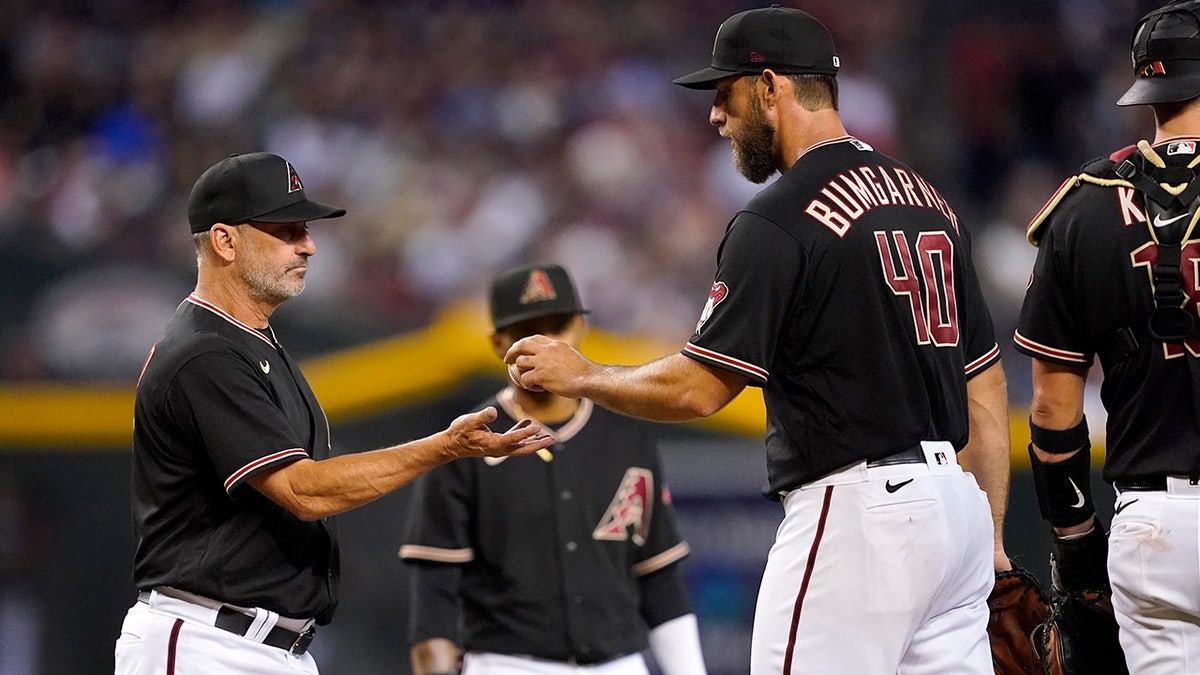 Torey Lovullo pulled Madison Bumgarner from mound