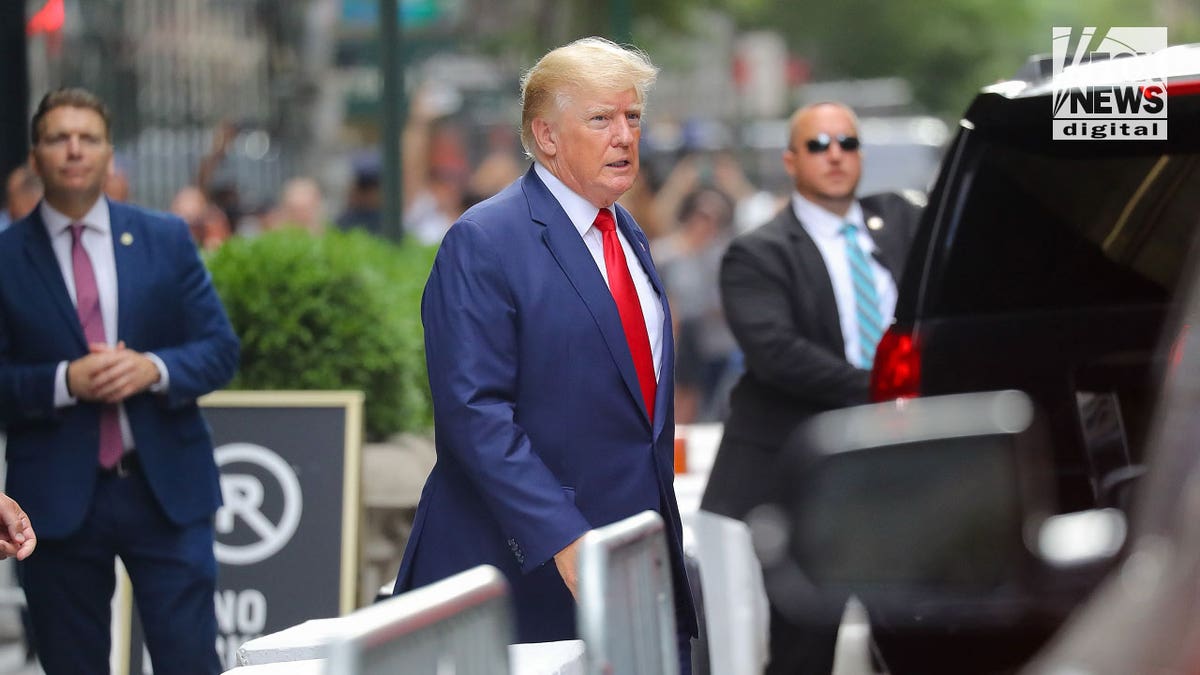 Donald Trump walking in New York City
