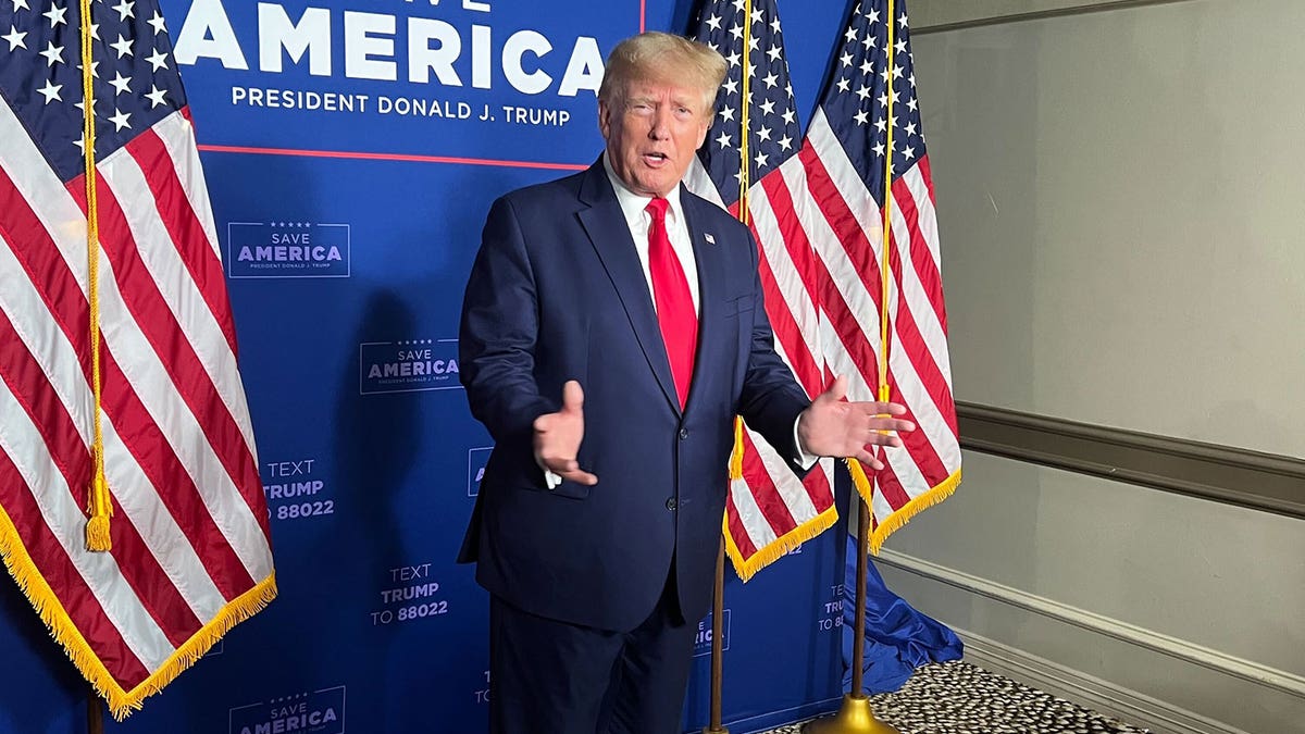 Trump speaks with reporters at CPAC